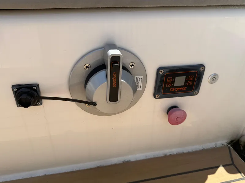 Slide: The Image of Control panel of a 2022 J Boats J/9 sailboat with Torqeedo throttle and display. - 12