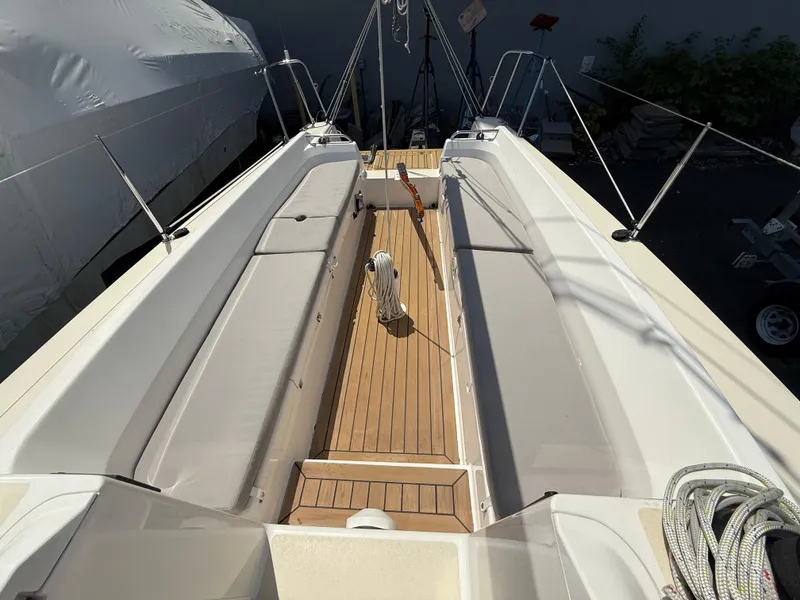 Slide: The Image of 2022 J Boats J/9 sailboat cockpit with teak flooring and seating. - 21