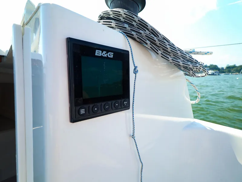 Slide: The Image of B&G display on 2022 J Boats J/9 sailboat, with coiled rope and water view. - 24