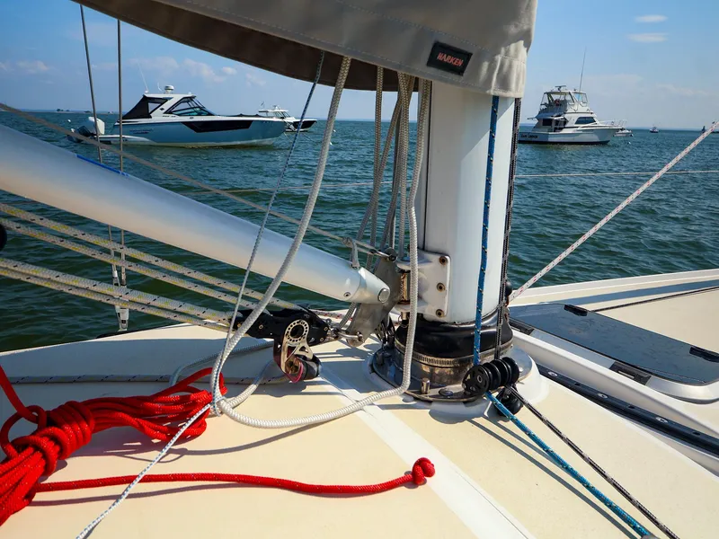 Slide: The Image of Sailboat deck with rigging, featuring J Boats J/9 model, 2022, on a sunny day. - 25