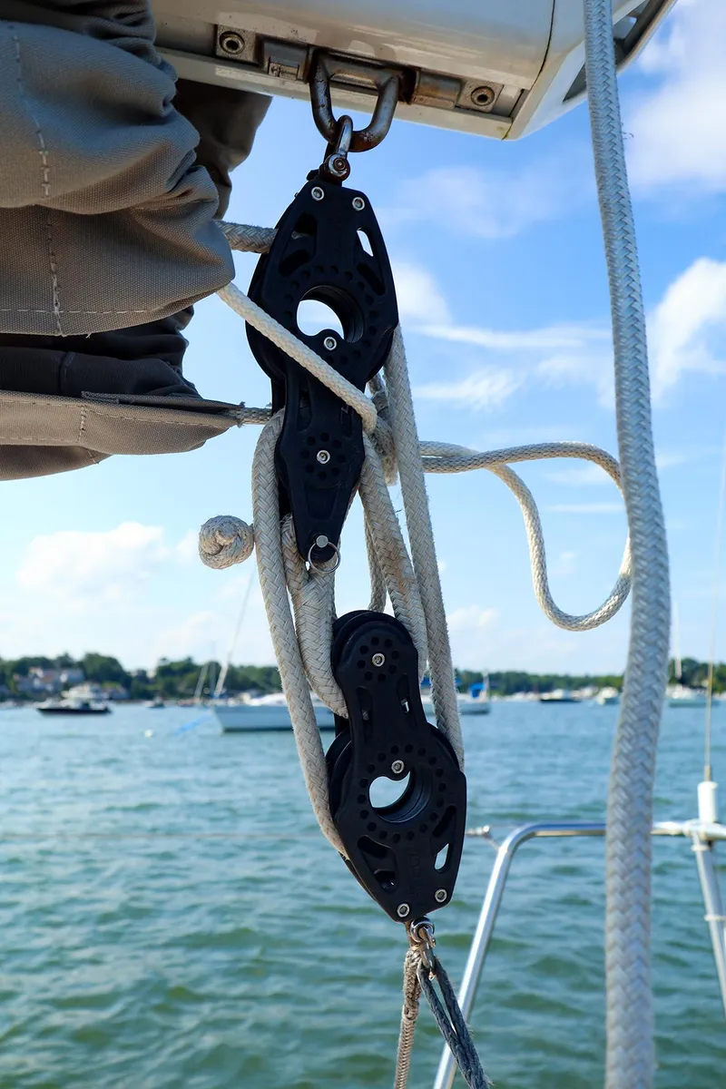 Slide: The Image of Pulley system on 2022 J Boats J/9 sailboat with scenic water background. - 26