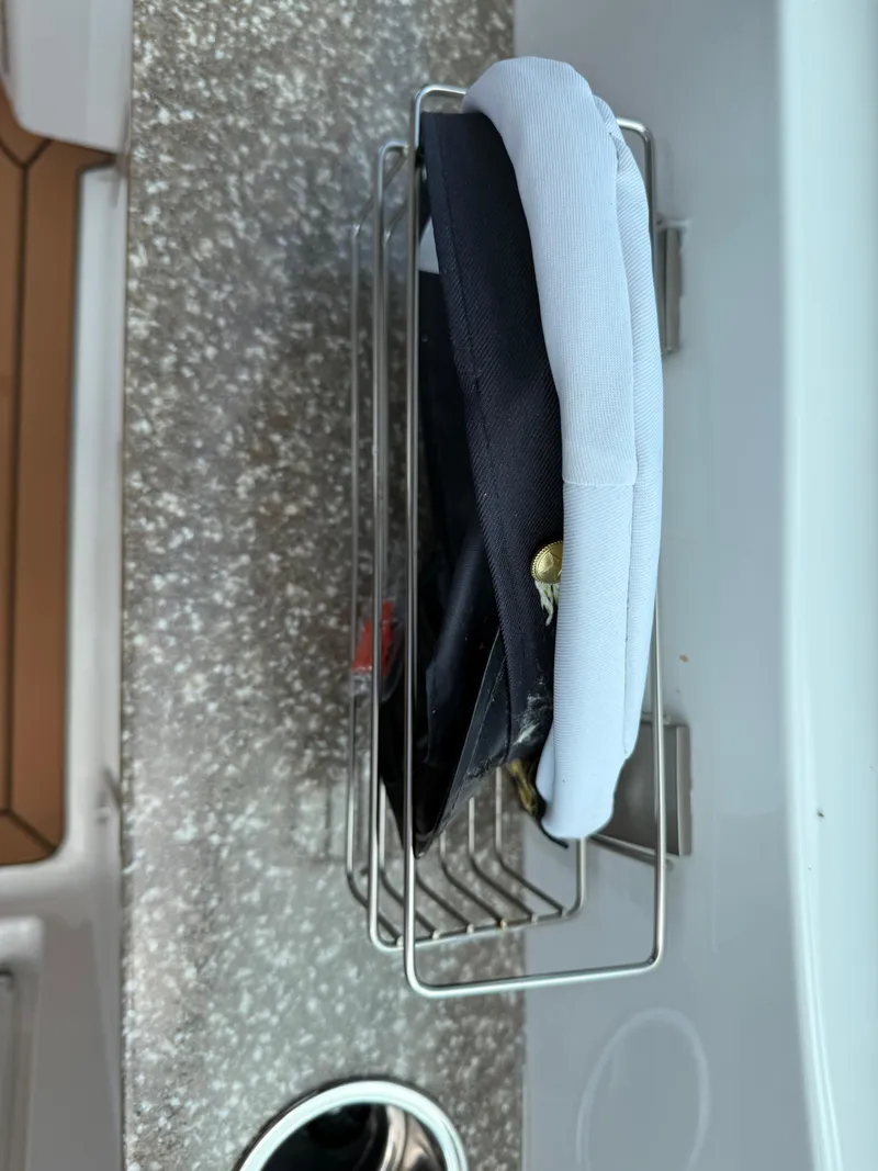 Slide: The Image of Sailboat interior with captain's hats on a rack, J Boats J/9, 2022 model. - 37