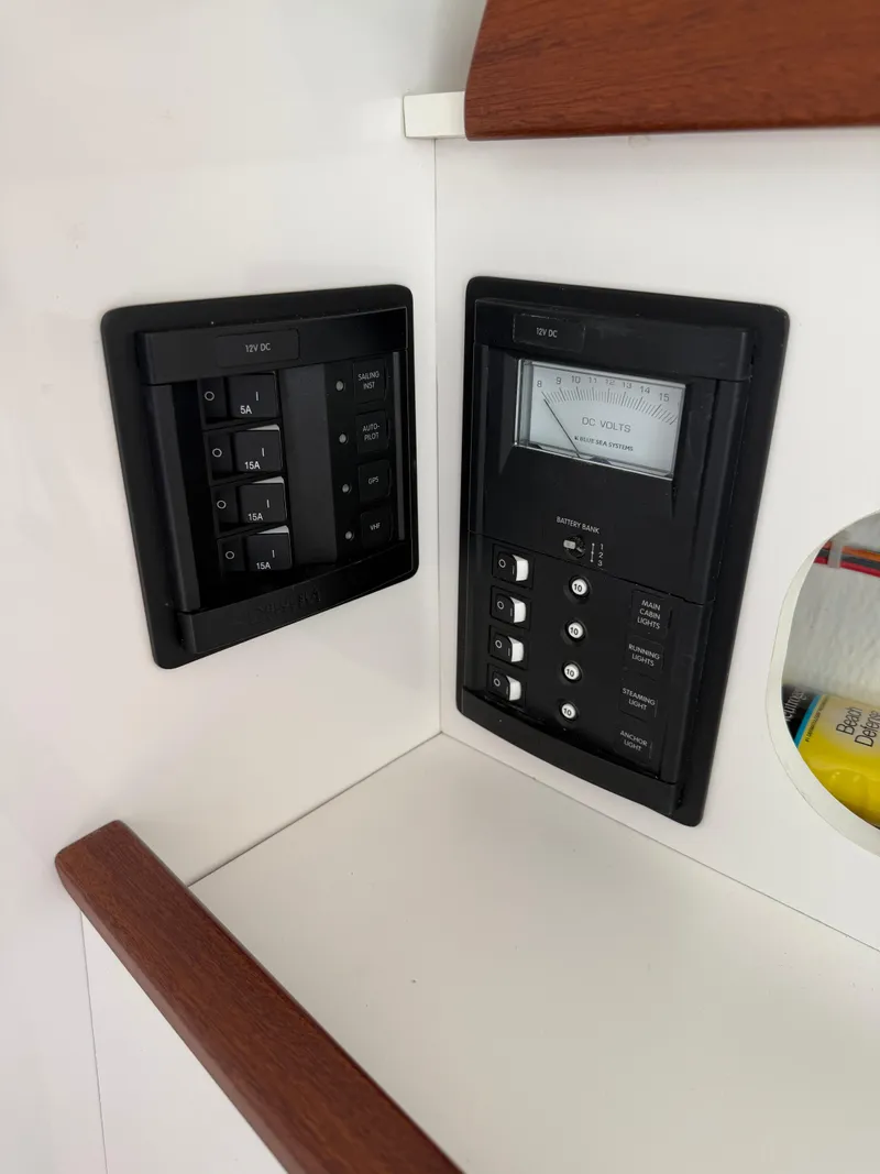 Slide: The Image of Control panel of 2022 J Boats J/9 sailboat with switches and meter. - 40