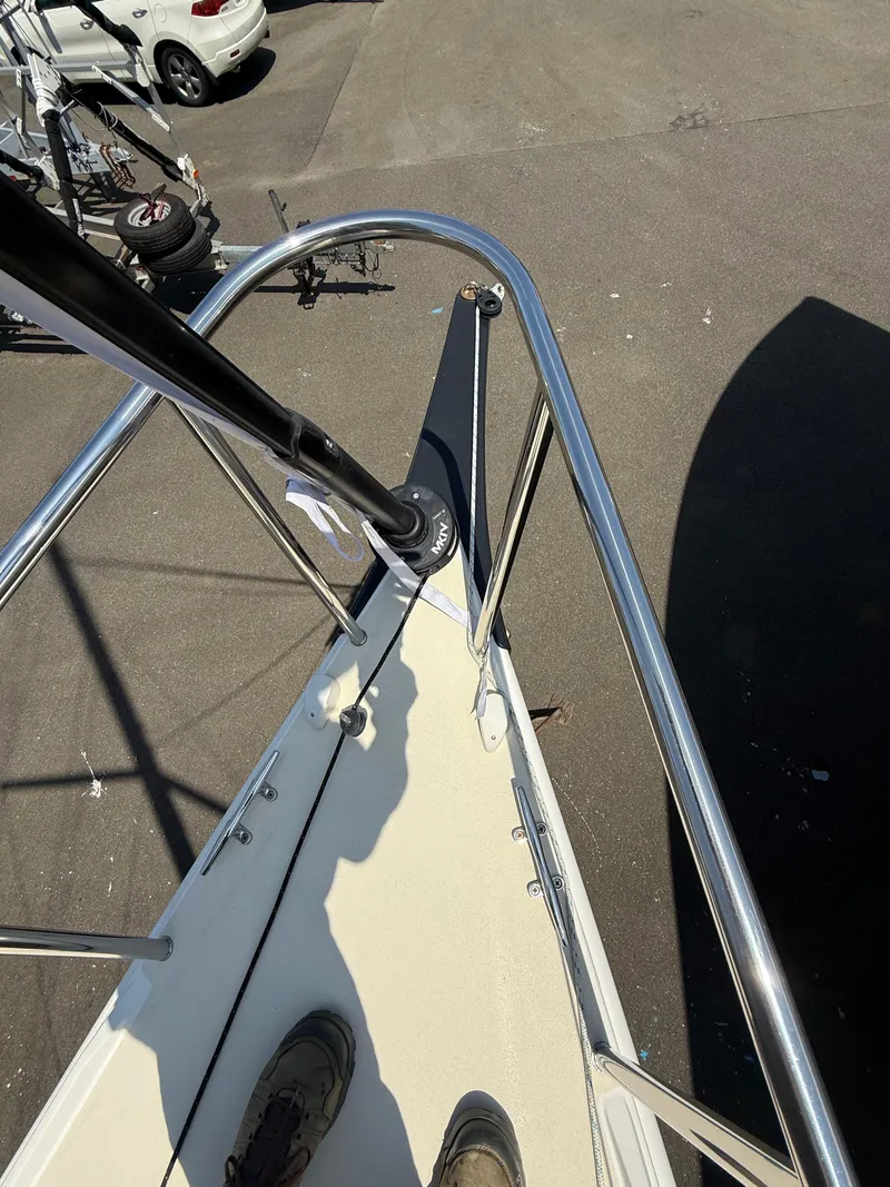 Slide: The Image of 2022 J Boats J/9 sailboat bow with stainless steel railing and deck view. - 7