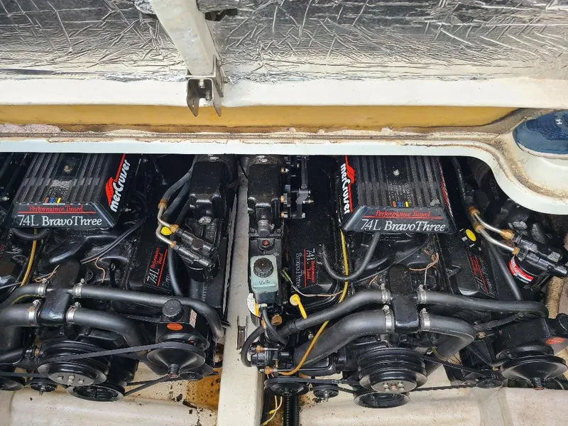 Slide: The Image of Twin MerCruiser 7.4L Bravo Three engines in a 1994 Formula 31 PC boat. - 12