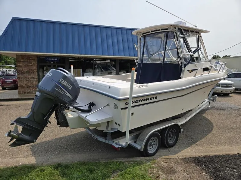 Slide: The Image of 2007 Grady-White 232 Gulfstream boat on trailer with Yamaha outboard motor. - 26