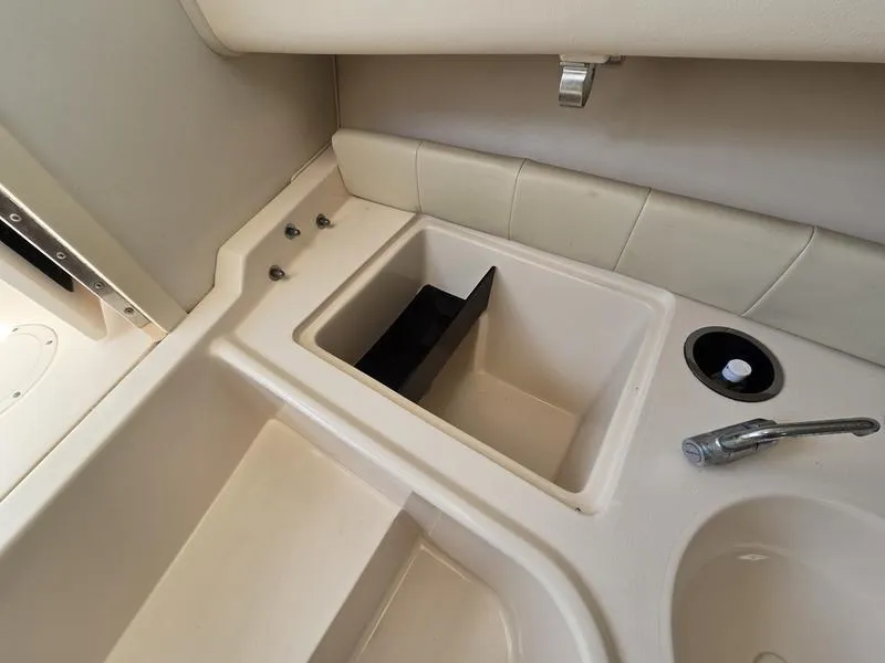 Slide: The Image of 2007 Grady-White 232 Gulfstream boat interior sink and counter area. - 3
