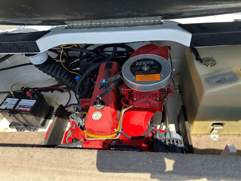 Slide: The Image of 2003 Chaparral 180 SS boat engine compartment with Volvo Penta engine. - 7