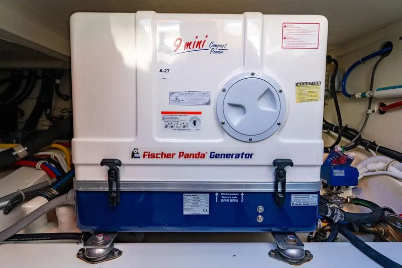 Slide: The Image of Fischer Panda generator in 2022 Tiara Yachts 43 LS engine room. - 24
