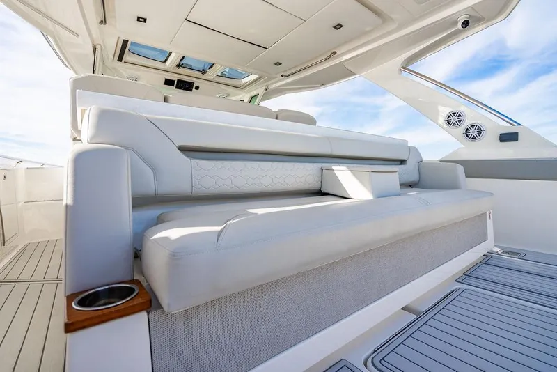 Slide: The Image of 2022 Tiara Yachts 43 LS interior with luxurious seating and modern design. - 9