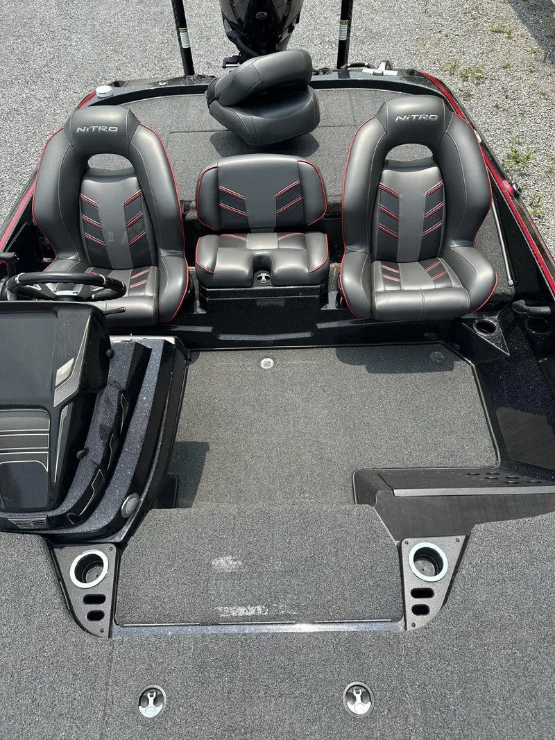 Slide: The Image of 2024 Nitro Z19 boat interior with dual seats and modern design. - 5