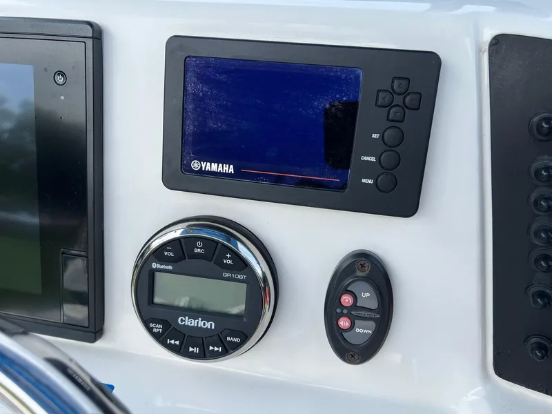 Slide: The Image of Control panel of 2018 Robalo 246 Cayman with Yamaha and Clarion displays. - 14
