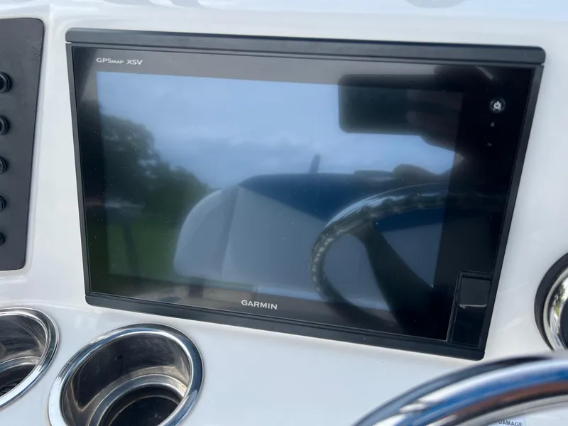 Slide: The Image of Garmin GPS display on 2018 Robalo 246 Cayman boat dashboard. - 16