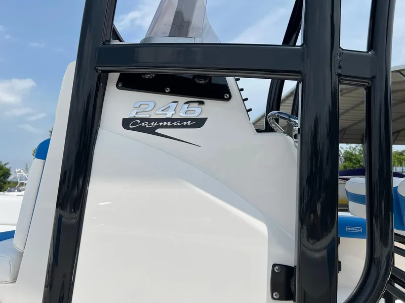 Slide: The Image of 2018 Robalo 246 Cayman boat console with logo and sleek design. - 4
