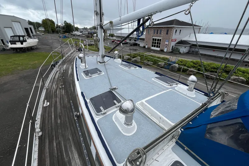Slide: The Image of 1983 Cheoy Lee Pedrick 41 sailboat deck view at a marina. - 13