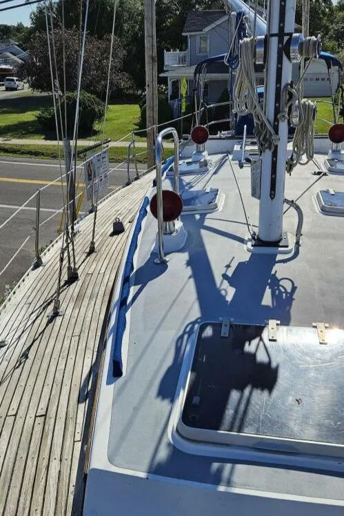 Slide: The Image of 1983 Cheoy Lee Pedrick 41 sailboat deck with rigging and hatches. - 16