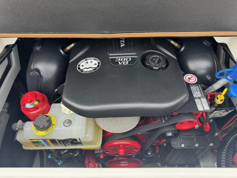 Slide: The Image of 2023 Crownline 280 SS SURF engine compartment with Volvo Penta 380 V8 engine. - 13