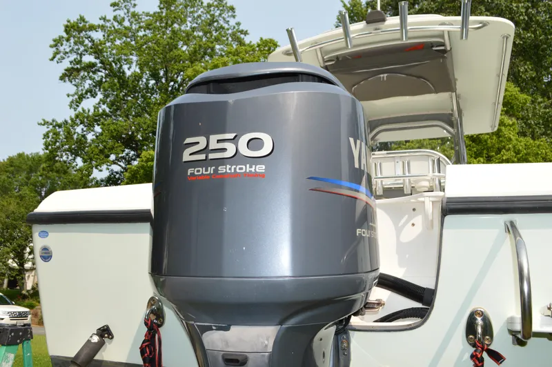 Slide: The Image of 2007 Edgewater 228CC boat with Yamaha 250 four-stroke outboard motor. - 11