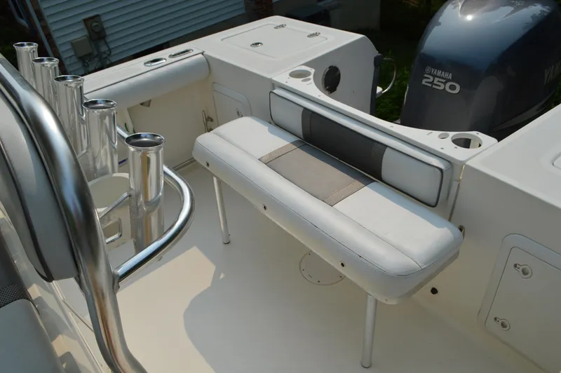 Slide: The Image of 2007 Edgewater 228CC boat interior with seating and Yamaha 250 engine. - 21