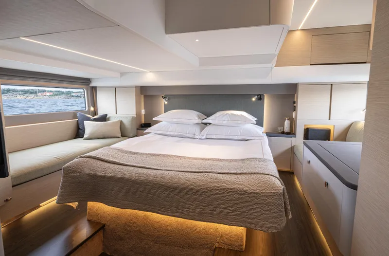 Slide: The Image of Luxurious interior of 2025 Nimbus 495 Flybridge yacht with elegant bedroom design. - 25