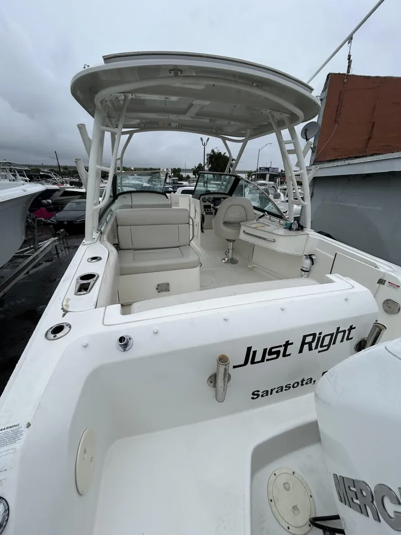Slide: The Image of 2018 Boston Whaler 230 Vantage boat, "Just Right," docked in Sarasota. - 7