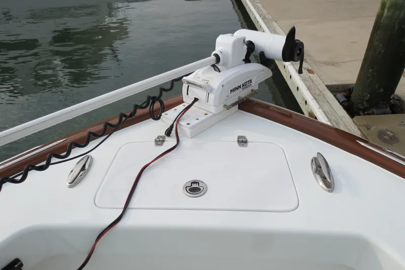 Slide: The Image of Valentino 28CC 2022 boat with Minn Kota trolling motor at dockside. - 7