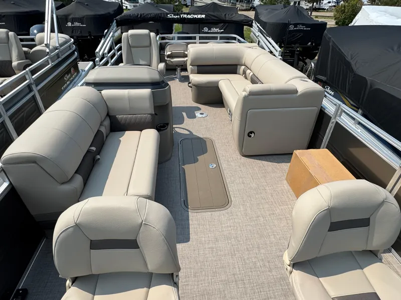 Slide: The Image of 2025 Sun Tracker Fishin' Barge 22 XP3 interior with spacious seating and modern design. - 8