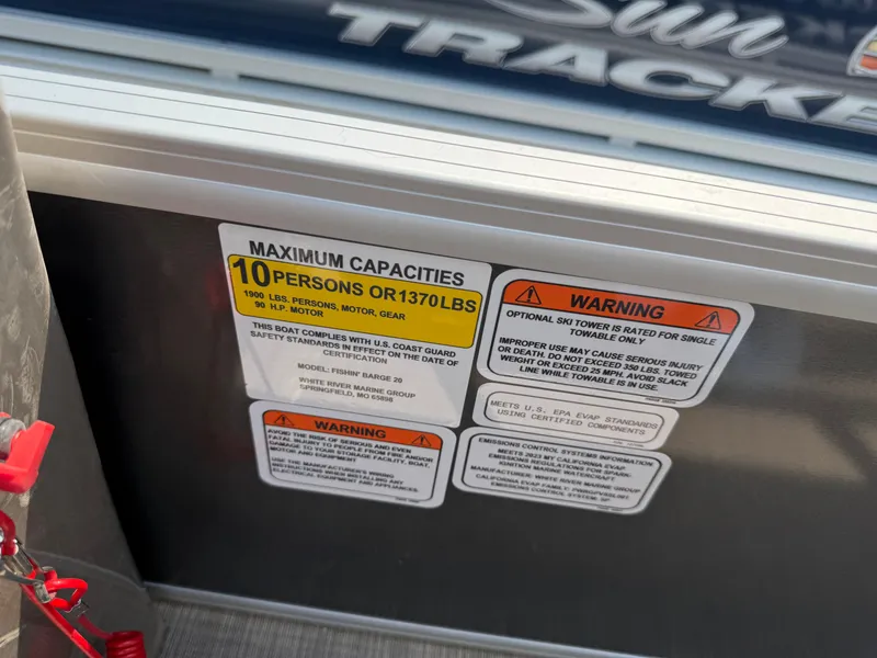 Slide: The Image of 2023 Sun Tracker Fishin' Barge 20 DLX capacity warning label, 10 persons or 1370 lbs. - 12