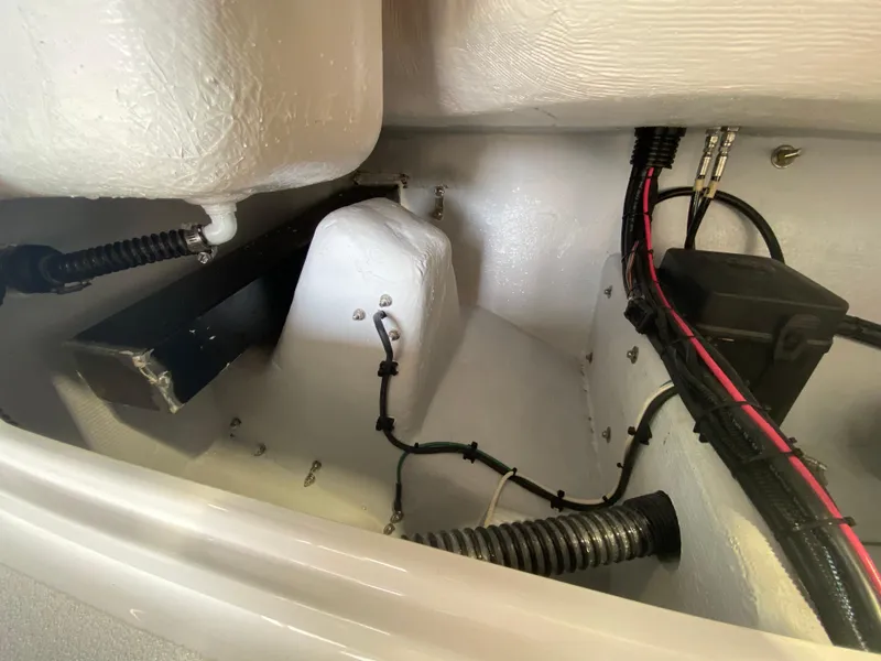 Slide: The Image of Interior view of 2026 Reef Runner 230 boat showing wiring and components. - 9