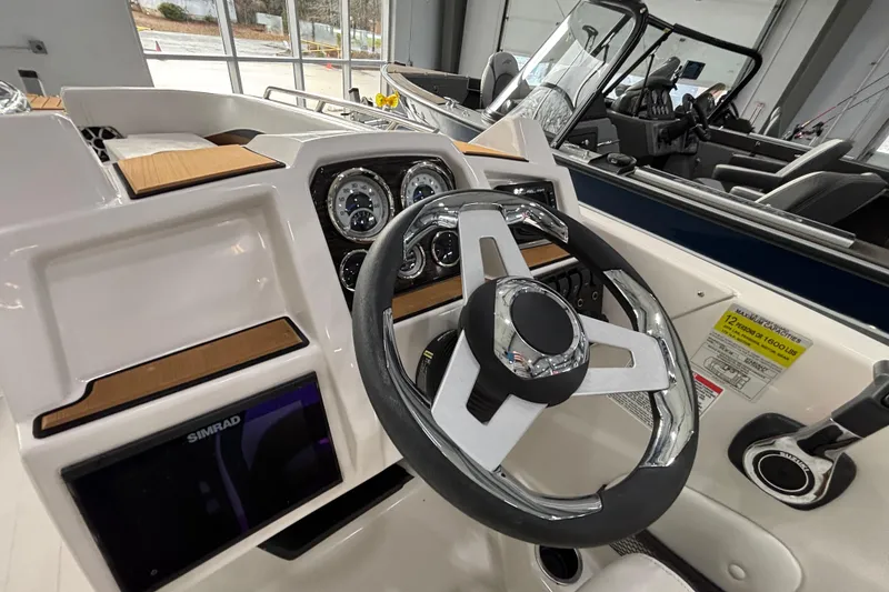 Slide: The Image of Interior view of 2025 Starcraft SVX 191 OB helm. - 14