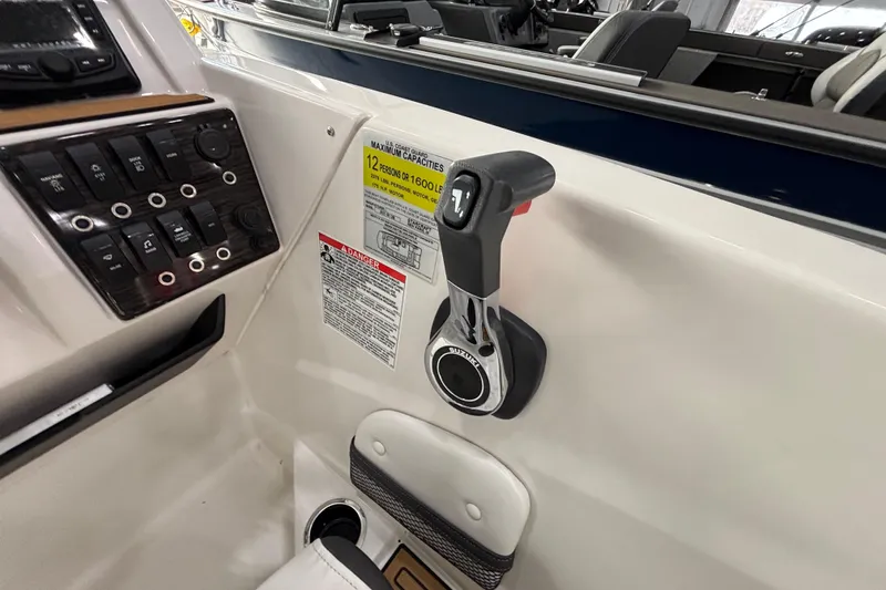 Slide: The Image of Interior view of 2025 Starcraft SVX 191 OB boat with control console. - 16