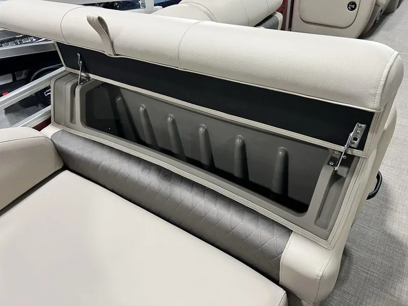 Slide: The Image of 2025 Sun Tracker PARTY BARGE® 22 RF DLX seat storage compartment, open and empty. - 20