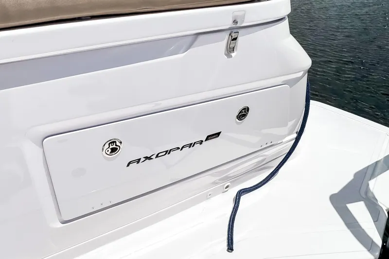 Slide: The Image of Axopar 45 Cross Top 2026 boat hull with logo and rope. - 17