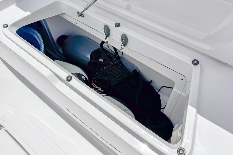 Slide: The Image of Storage compartment in Axopar 45 Cross Top boat, year 2026. - 19