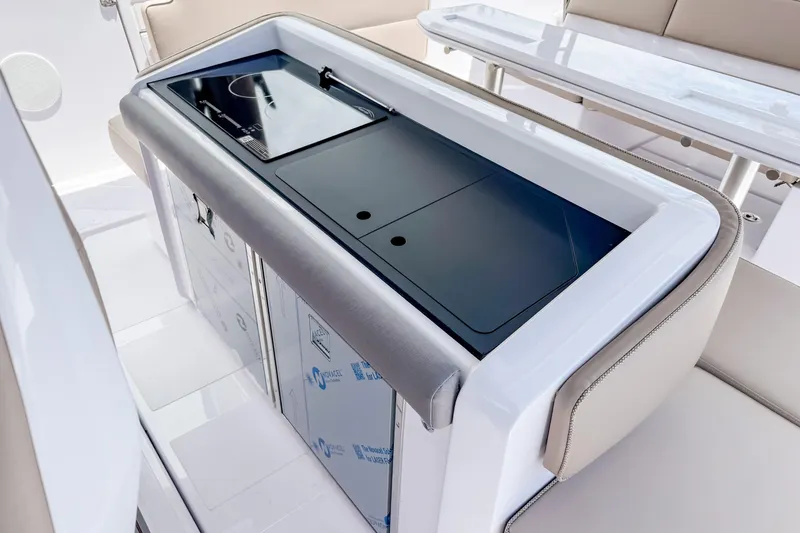 Slide: The Image of Interior of Axopar 45 Cross Top 2026 with modern amenities. - 28