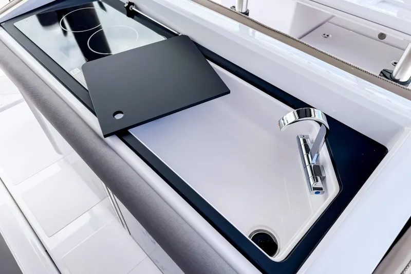 Slide: The Image of Modern kitchen on Axopar 45 Cross Top 2026 boat. - 29