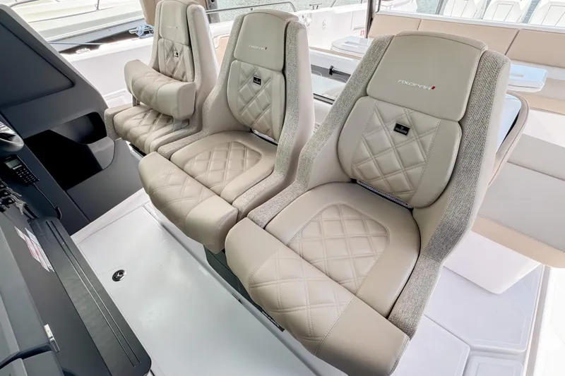 Slide: The Image of Luxurious seating in the 2026 Axopar 45 Cross Top boat. - 35