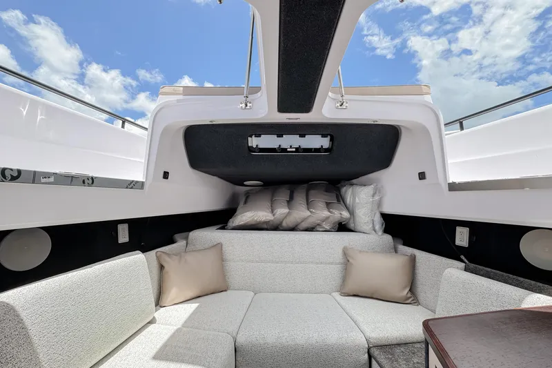 Slide: The Image of Interior of 2026 Axopar 45 Cross Top with cozy seating area. - 37