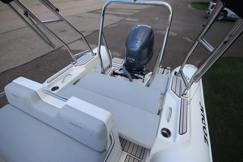 Slide: The Image of 2025 Zodiac Medline 5.8 NEO boat with 115hp engine, featuring sleek seating and modern design. - 9