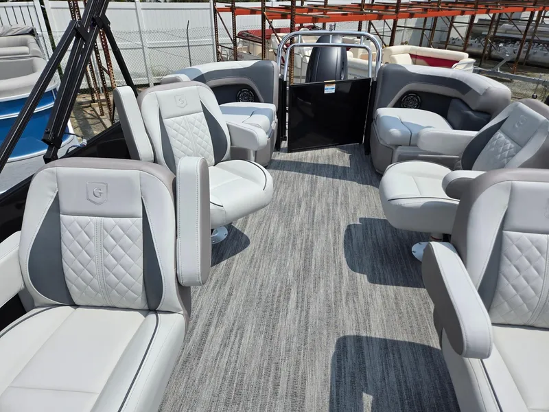 Slide: The Image of 2026 Godfrey Sweetwater 2286 QS pontoon boat with luxurious seating and modern design. - 10