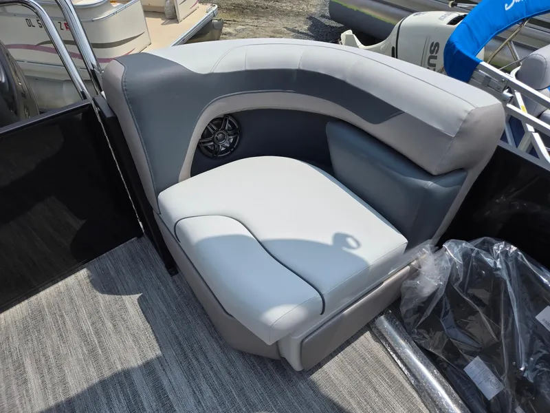 Slide: The Image of Luxurious seating on 2026 Godfrey Sweetwater 2286 QS pontoon boat, featuring plush gray upholstery. - 24