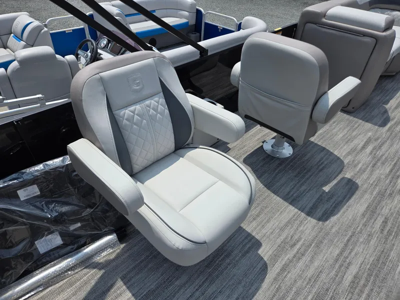 Slide: The Image of 2026 Godfrey Sweetwater 2286 QS boat seats with gray upholstery and diamond stitching. - 29