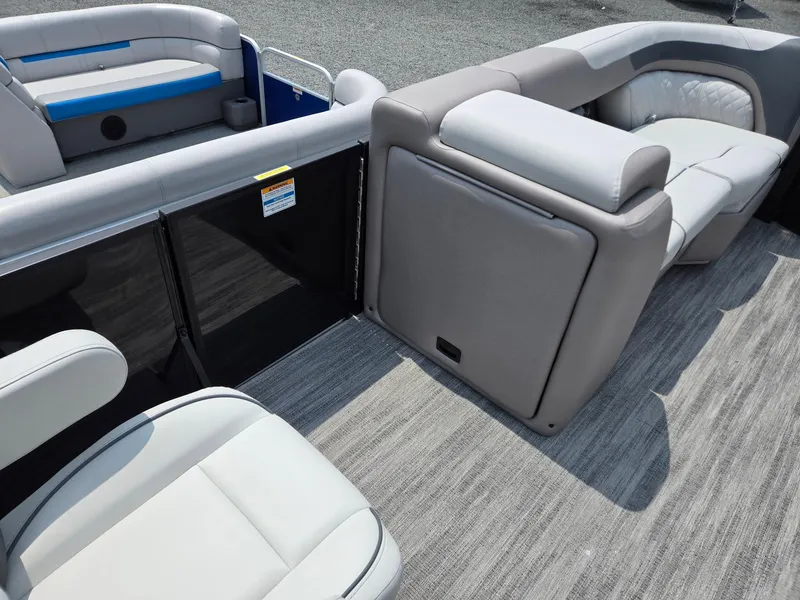 Slide: The Image of 2026 Godfrey Sweetwater 2286 QS pontoon boat interior with gray seating and flooring. - 32
