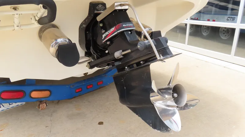 Slide: The Image of Rear view of a 2002 Nordic 28 Heat boat with Mercury outboard motor. - 4