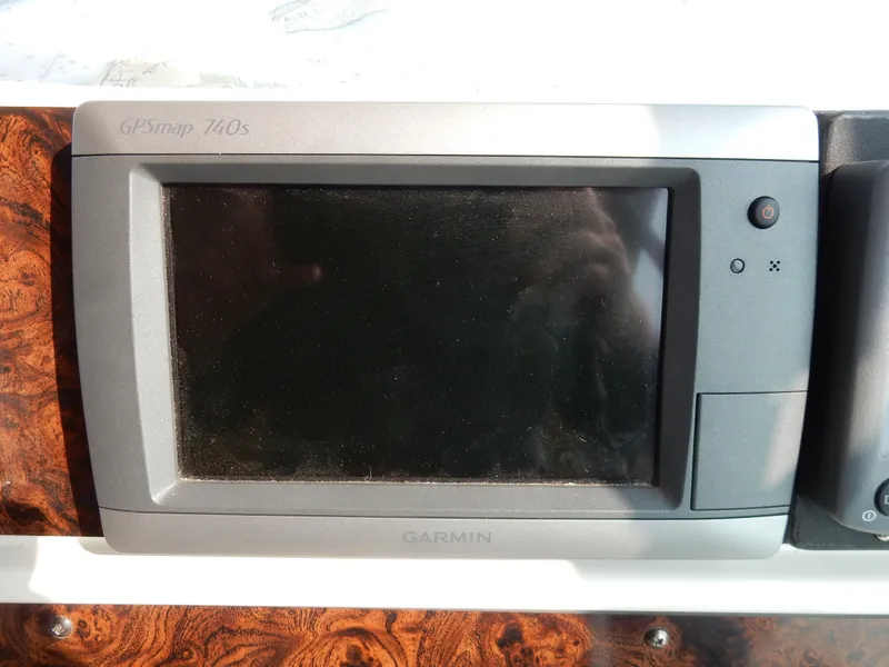Slide: The Image of Garmin GPSmap 140s on 1997 Sea Ray 450 boat dashboard. - 39