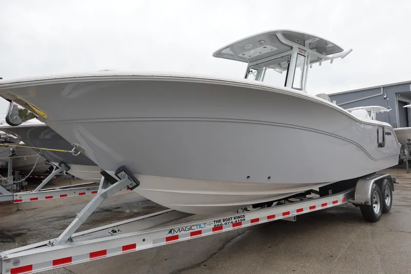 Slide: The Image of 2025 Sea Fox 268 Commander boat on trailer, showcasing sleek design and modern features. - 0
