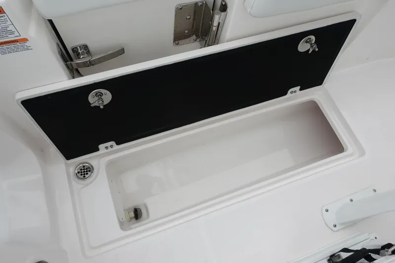Slide: The Image of Storage compartment on a 2025 Sea Fox 268 Commander boat. - 12