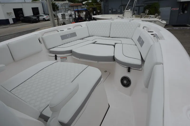 Slide: The Image of 2025 Sea Fox 268 Commander boat with spacious white seating area. - 14