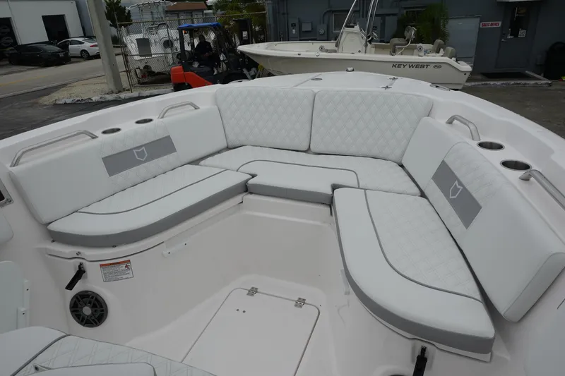 Slide: The Image of 2025 Sea Fox 268 Commander boat with spacious, cushioned seating area. - 15