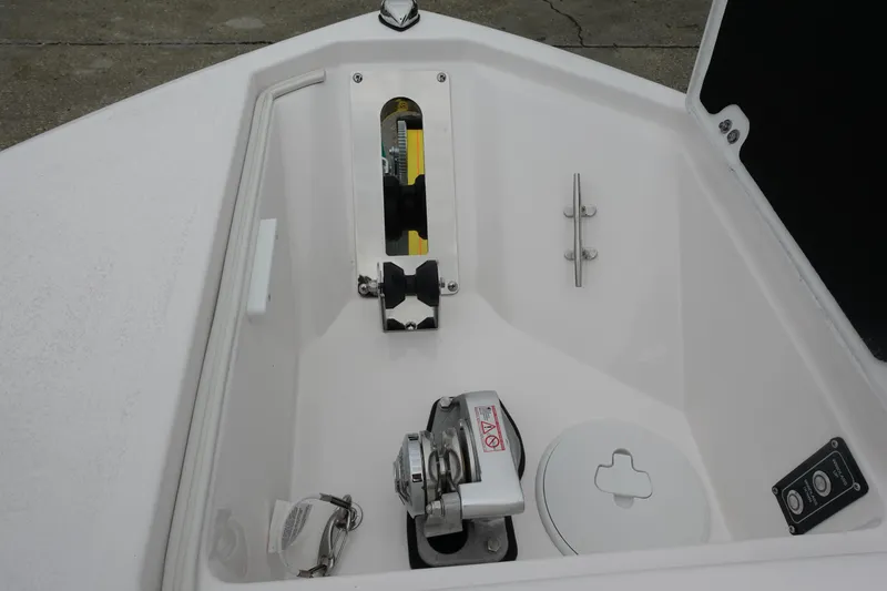 Slide: The Image of 2025 Sea Fox 268 Commander anchor compartment with winch and storage features. - 18